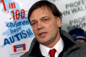 Doctor Andrew Wakefield speaks to the media after a hearing at the General Medical Council in London